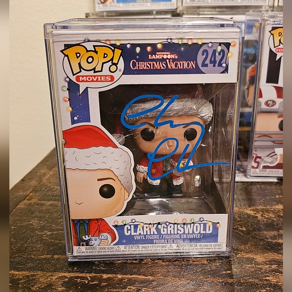 Autographed Clark Griswold Christmas Vacation Funko Pop signed by Chevy Chase